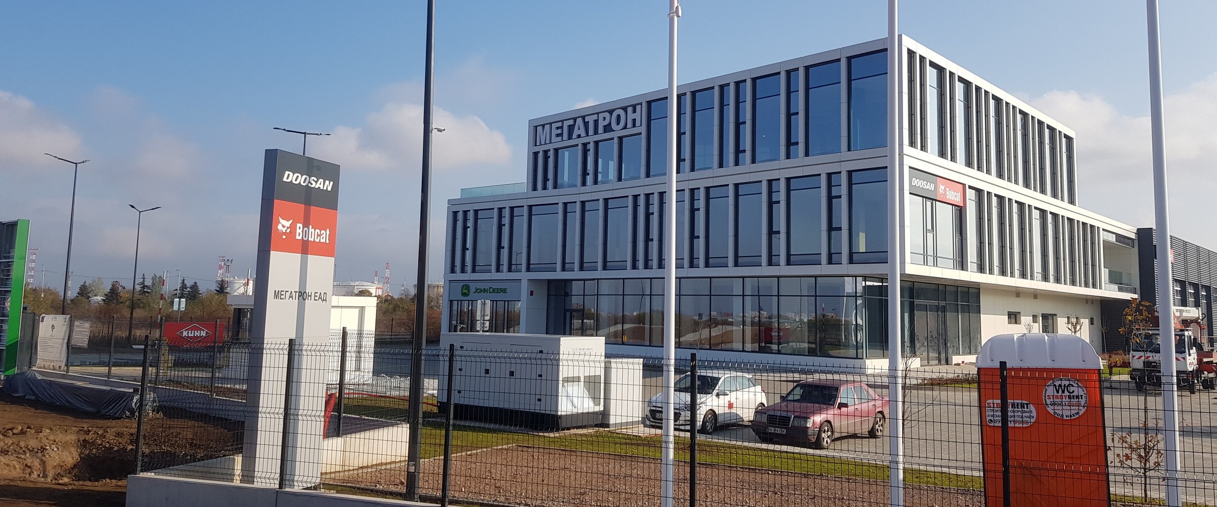 Sales and service complex for agricultural and construction machinery with office part